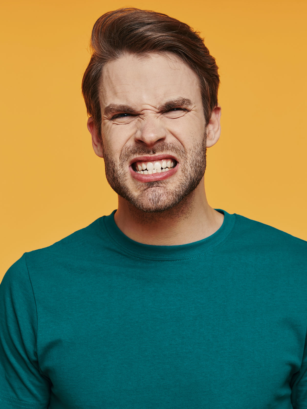 portrait-of-angry-young-man-looking-at-camera-and-2022-12-16-13-41-18-utc.jpg